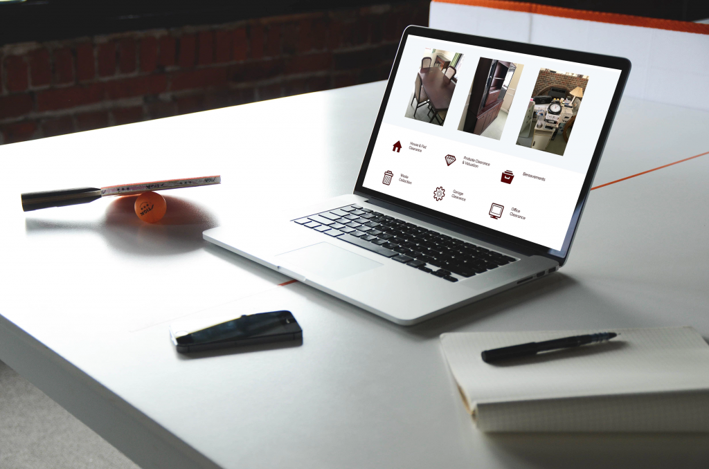 dorset house clearance wordpress theme design on laptop