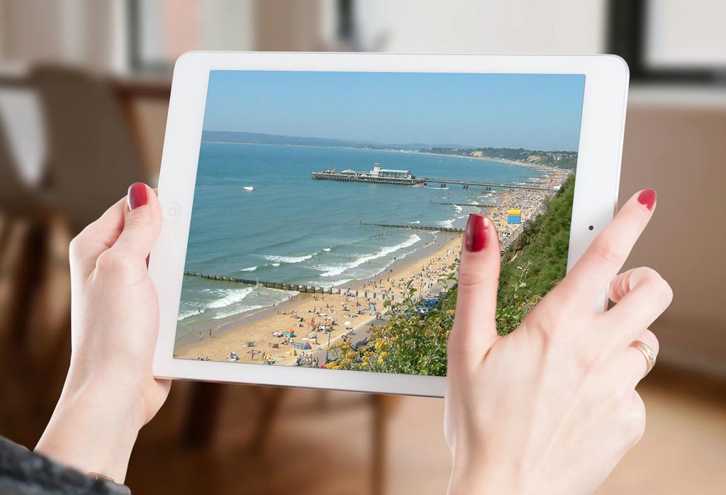 website designer in Bournemouth holding a tablet